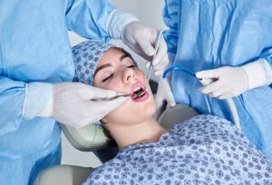 Woman undergoing dental procedure